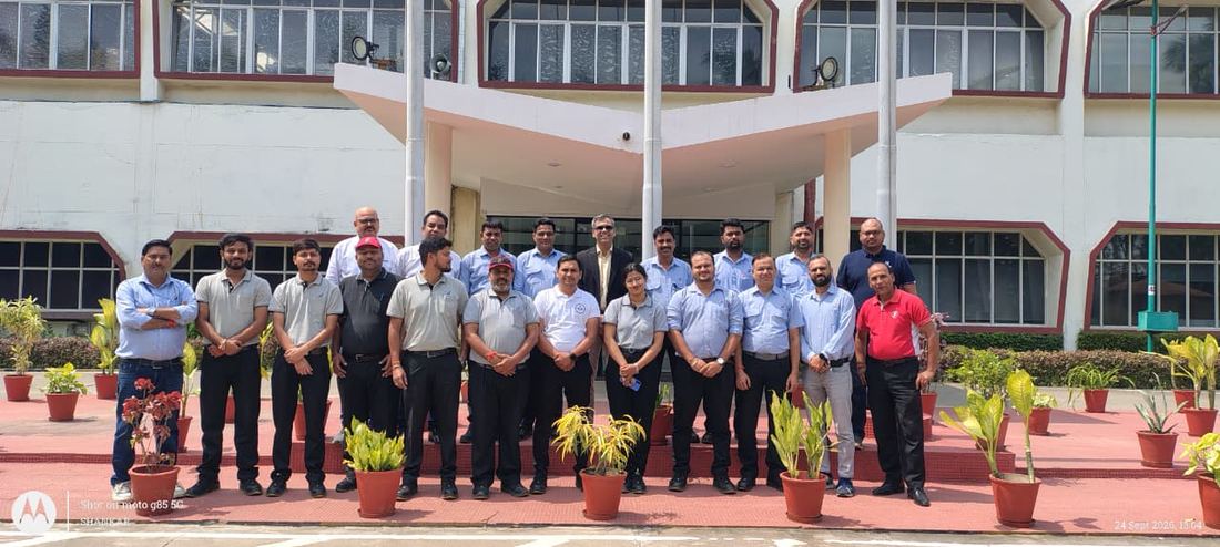 Faiyaz with the Bridgestone workshop participants outside the plant